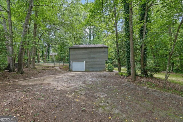 361 Gordon Valley Ln SW, Mableton, GA 30126 - view of yard featuring a garage, driveway, and an outdoor structure