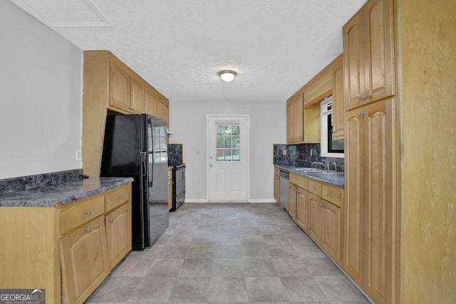 361 Gordon Valley Ln SW, Mableton, GA 30126 - kitchen featuring freestanding refrigerator, dark countertops, a sink, dishwasher, and tasteful backsplash