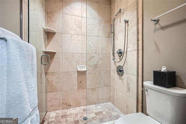 2499 Peachtree Rd Unit 108, Atlanta, GA 30305 - bathroom featuring toilet and a shower stall