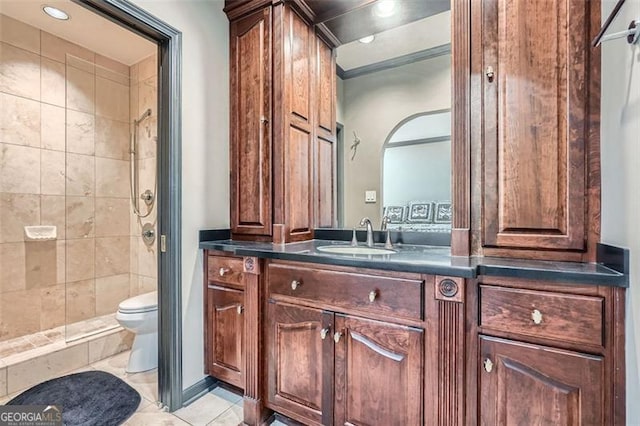 2499 Peachtree Rd Unit 108, Atlanta, GA 30305 - bathroom featuring toilet, a shower stall, vanity, tile patterned floors, and recessed lighting