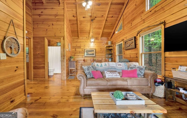 1157 Laurel Creek Rd, Blue Ridge, GA 30513 - living room featuring wood walls, hardwood / wood-style flooring, a ceiling fan, high vaulted ceiling, and wooden ceiling