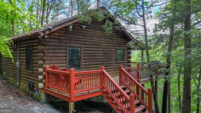 1157 Laurel Creek Rd, Blue Ridge, GA 30513 - back of house with log siding and a wooden deck