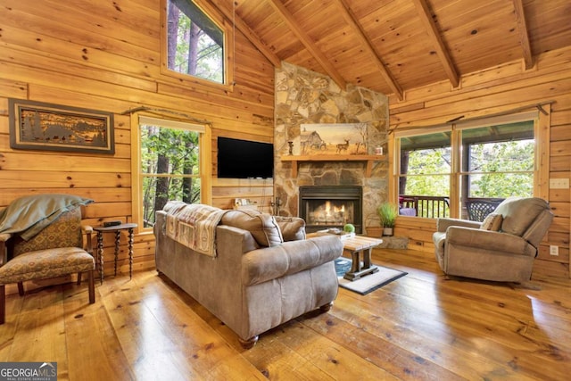 1157 Laurel Creek Rd, Blue Ridge, GA 30513 - living area featuring wood ceiling, hardwood / wood-style flooring, plenty of natural light, wooden walls, and beam ceiling