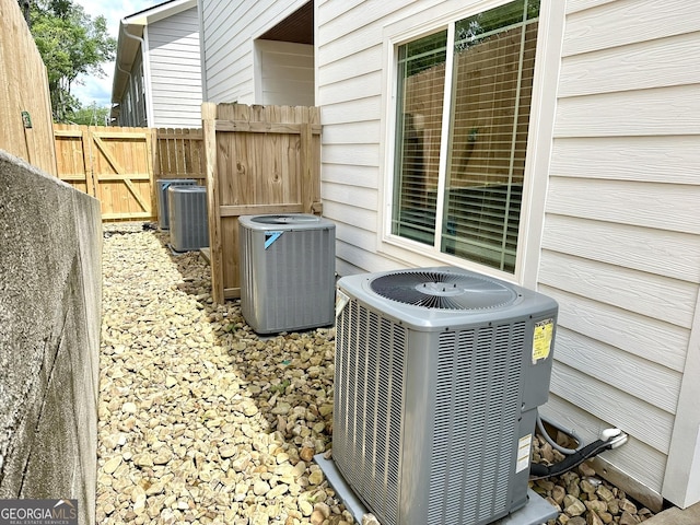 exterior view of cooling unit and fence