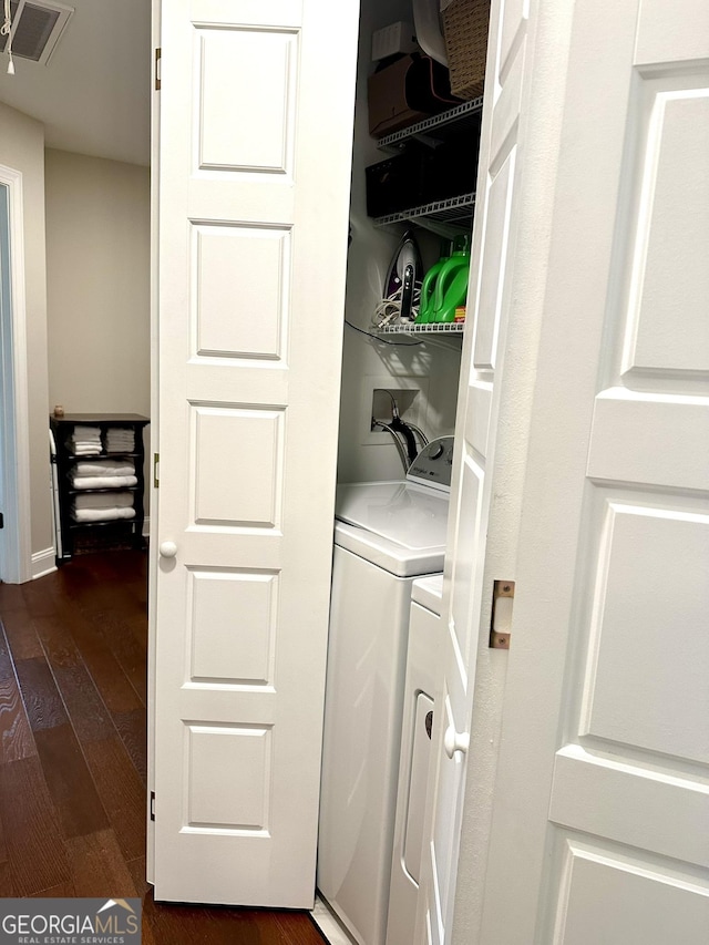 621 E 3rd St # 9, Rome, GA 30161 - laundry room with washer and clothes dryer and dark wood finished floors