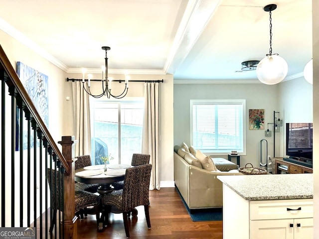 dining area with a chandelier, healthy amount of natural light, dark wood-style flooring, crown molding, and stairway