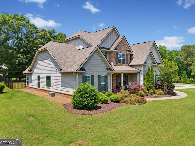 161 Archstone Sq, Mcdonough, GA 30253 - view of side of property featuring board and batten siding and a shingled roof