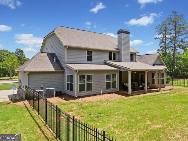 161 Archstone Sq, Mcdonough, GA 30253 - rear view of property featuring outdoor lounge area, a chimney, a patio, roof with shingles, and central AC unit