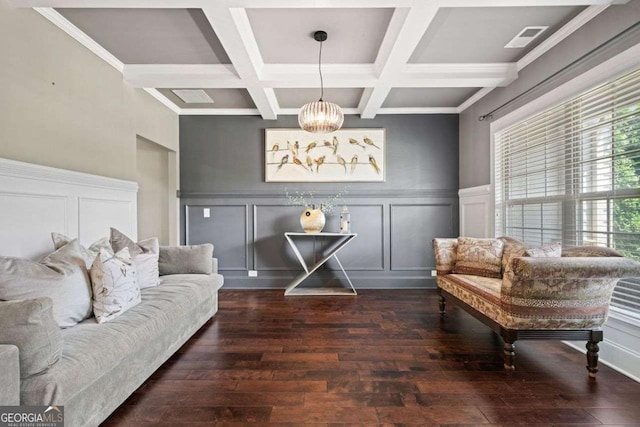 161 Archstone Sq, Mcdonough, GA 30253 - living room with beam ceiling, a decorative wall, hardwood / wood-style floors, coffered ceiling, and a chandelier