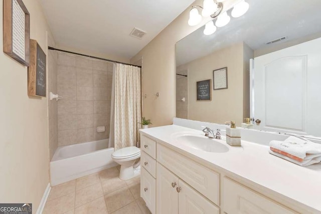 bathroom with tile patterned flooring, toilet, vanity, shower / bath combo, and baseboards