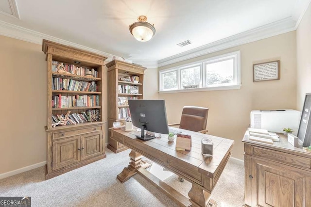 office space with ornamental molding, light colored carpet, and baseboards