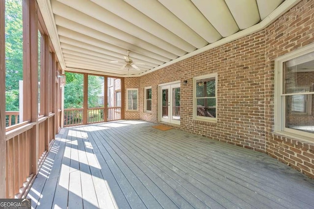 wooden terrace featuring ceiling fan