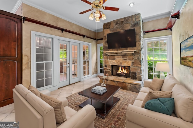 11569 Finley Rd, Johns Creek, GA 30024 - living area featuring french doors, light tile patterned flooring, crown molding, ceiling fan, and a stone fireplace