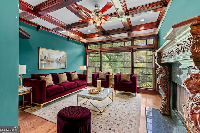 11569 Finley Rd, Johns Creek, GA 30024 - living area featuring a premium fireplace, ceiling fan, wood finished floors, beam ceiling, and coffered ceiling