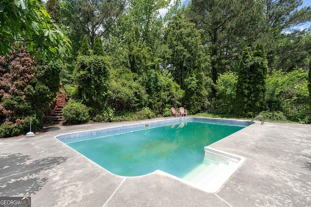 11569 Finley Rd, Johns Creek, GA 30024 - outdoor pool with stairs and a patio area