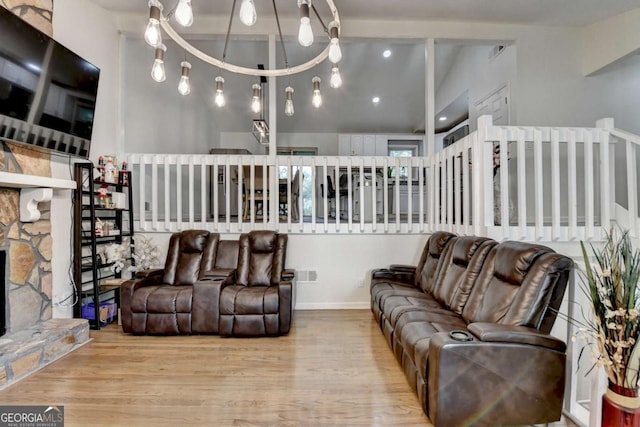 1358 Millstream Trl, Lawrenceville, GA 30044 - living room with wood finished floors and a stone fireplace