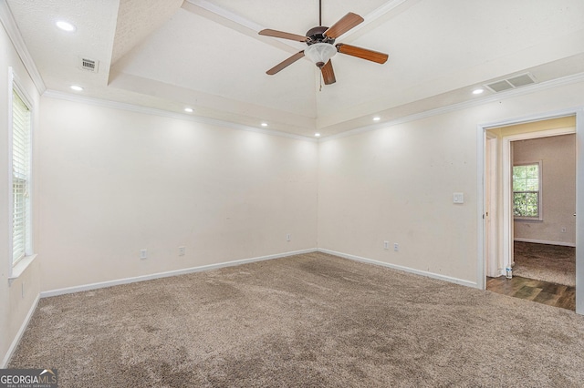 220 Windpher Rdg, Hampton, GA 30228 - carpeted spare room with ornamental molding, recessed lighting, ceiling fan, baseboards, and a raised ceiling