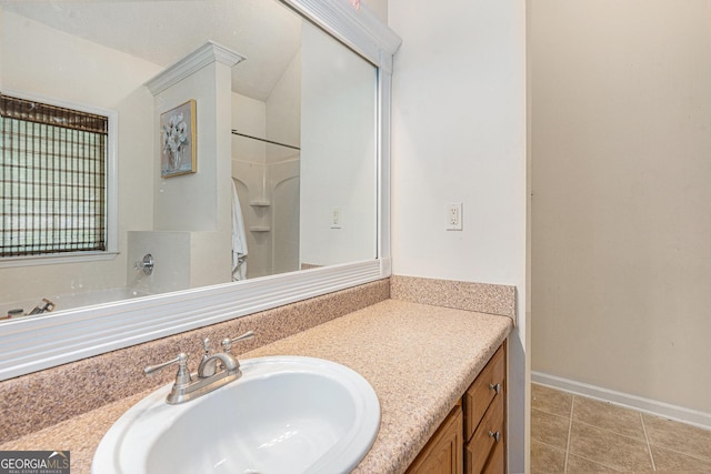 220 Windpher Rdg, Hampton, GA 30228 - full bath featuring vanity, tile patterned flooring, baseboards, and a shower