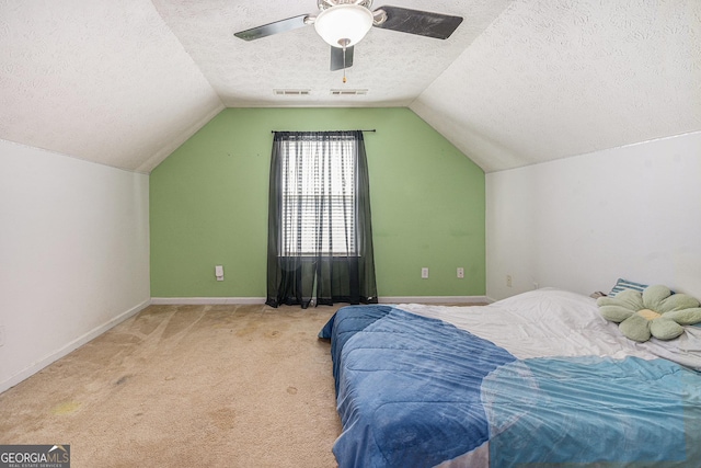 220 Windpher Rdg, Hampton, GA 30228 - bedroom with a textured ceiling, lofted ceiling, carpet flooring, ceiling fan, and baseboards