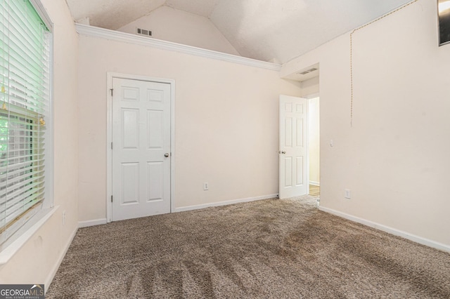 220 Windpher Rdg, Hampton, GA 30228 - carpeted spare room featuring lofted ceiling and baseboards
