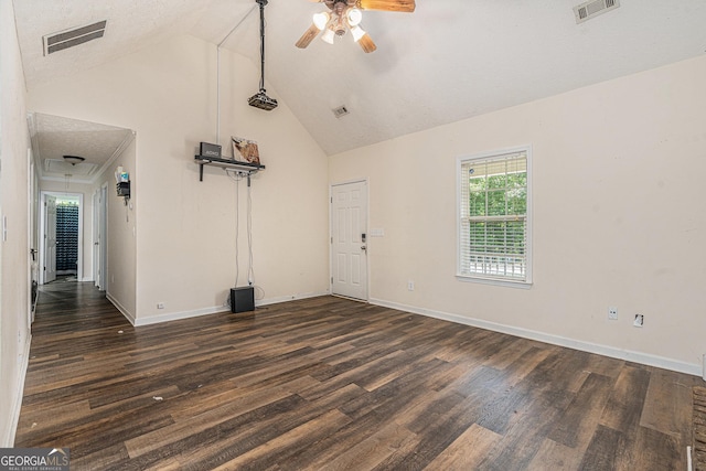220 Windpher Rdg, Hampton, GA 30228 - spare room with ceiling fan, high vaulted ceiling, dark wood-type flooring, baseboards, and attic access