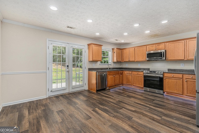 220 Windpher Rdg, Hampton, GA 30228 - kitchen with stainless steel appliances, crown molding, french doors, dark wood-type flooring, and dark countertops