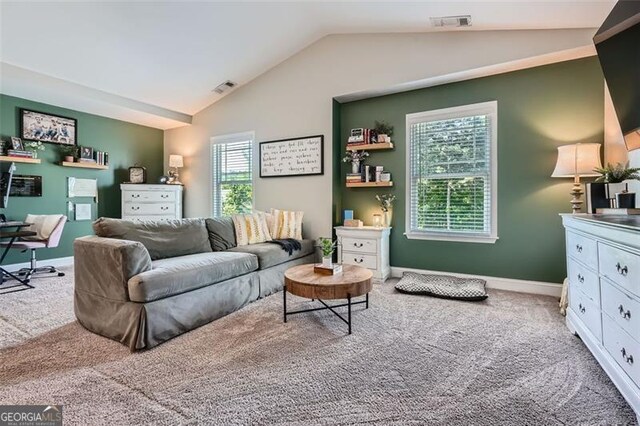 837 Brown Thrasher Way, Bremen, GA 30110 - carpeted living room featuring lofted ceiling and baseboards