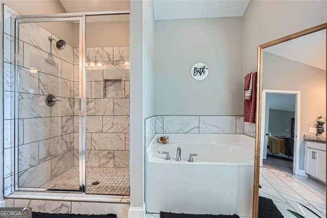 837 Brown Thrasher Way, Bremen, GA 30110 - full bath with a stall shower, a bath, marble look tile flooring, and ensuite bathroom