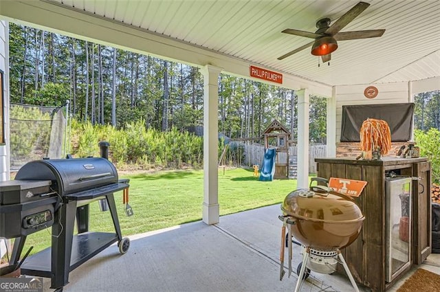 837 Brown Thrasher Way, Bremen, GA 30110 - view of patio featuring a playground, a ceiling fan, and a grill