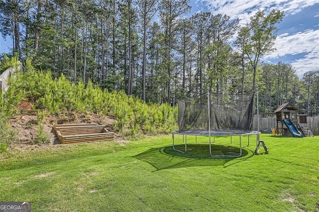 837 Brown Thrasher Way, Bremen, GA 30110 - view of yard featuring a trampoline and a playground