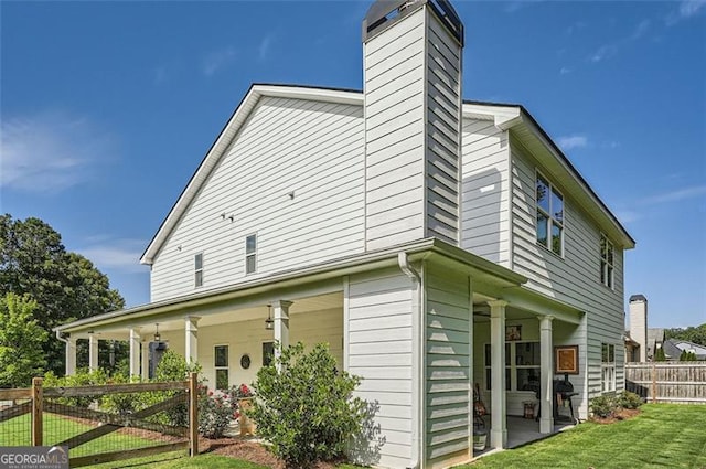 837 Brown Thrasher Way, Bremen, GA 30110 - view of property exterior with a chimney and a patio area