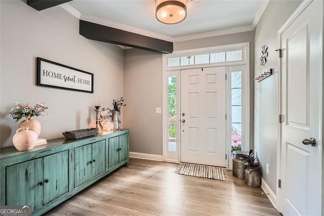 837 Brown Thrasher Way, Bremen, GA 30110 - foyer entrance featuring light wood-type flooring, ornamental molding, and baseboards