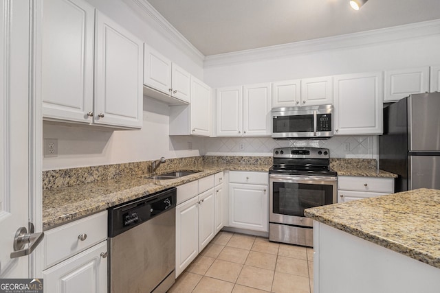 1850 Cotillion Dr Unit 4218, Atlanta, GA 30338 - kitchen featuring stainless steel appliances, a sink, white cabinetry, light tile patterned floors, and light stone countertops