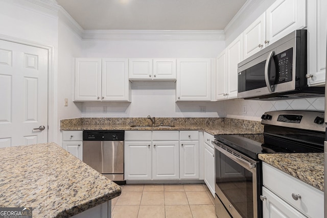 1850 Cotillion Dr Unit 4218, Atlanta, GA 30338 - kitchen featuring appliances with stainless steel finishes, white cabinetry, and ornamental molding