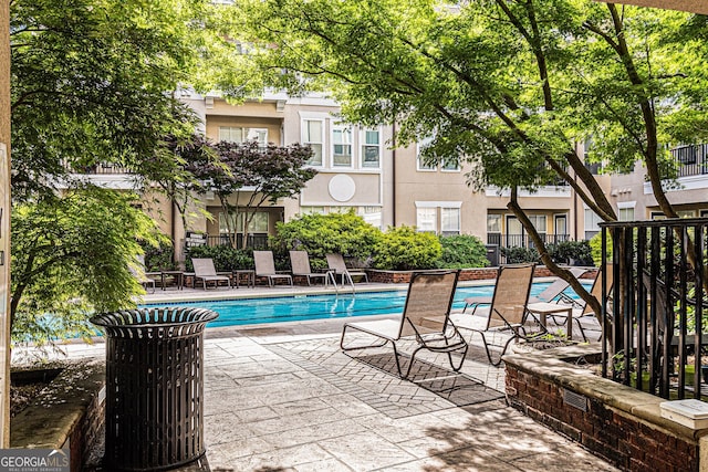 1850 Cotillion Dr Unit 4218, Atlanta, GA 30338 - community pool with a patio area