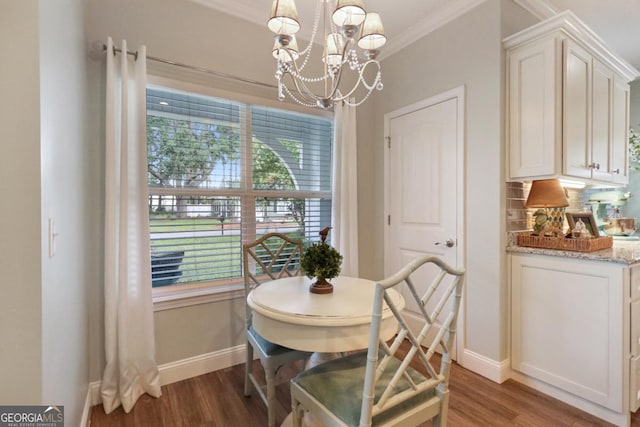 156 Hannah Dr, Jesup, GA 31546 - dining area with a chandelier, light wood-style floors, plenty of natural light, and crown molding