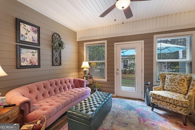 156 Hannah Dr, Jesup, GA 31546 - living room with wood walls, a ceiling fan, wooden ceiling, and wood finished floors