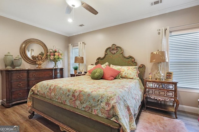 156 Hannah Dr, Jesup, GA 31546 - bedroom featuring wood finished floors, crown molding, and a ceiling fan