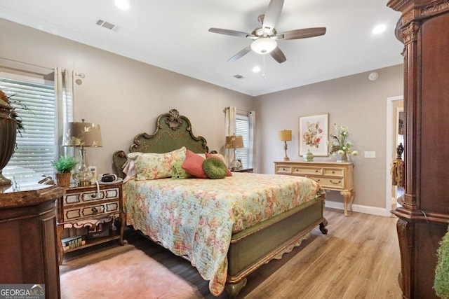 156 Hannah Dr, Jesup, GA 31546 - bedroom with light wood-style floors, recessed lighting, ceiling fan, and crown molding