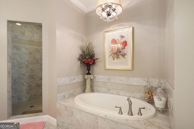 156 Hannah Dr, Jesup, GA 31546 - full bathroom featuring crown molding, a stall shower, a garden tub, and a chandelier