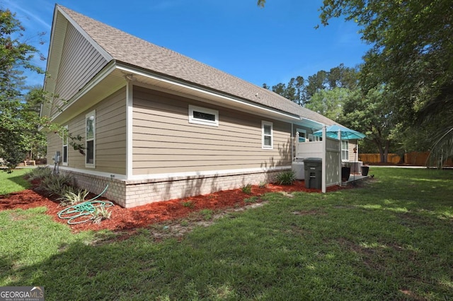 156 Hannah Dr, Jesup, GA 31546 - view of home's exterior featuring a shingled roof