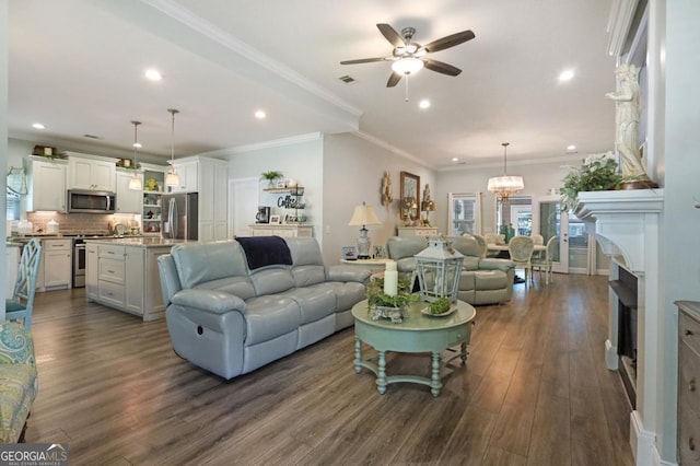 156 Hannah Dr, Jesup, GA 31546 - living area featuring ceiling fan, dark wood-style floors, recessed lighting, a fireplace, and ornamental molding