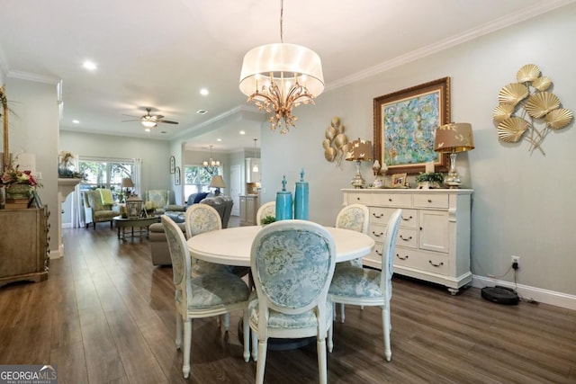 156 Hannah Dr, Jesup, GA 31546 - dining area featuring a chandelier, dark wood finished floors, a ceiling fan, recessed lighting, and ornamental molding