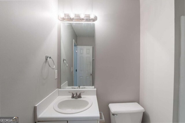 3075 Oakvale Hts, Decatur, GA 30034 - bathroom with a textured ceiling, toilet, and bathtub / shower combination