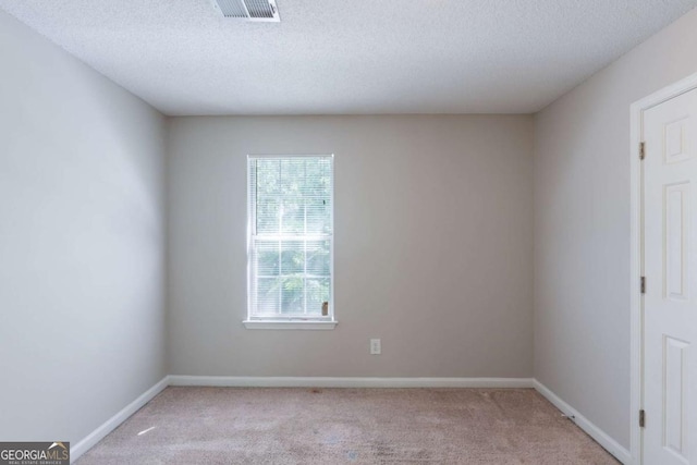 3075 Oakvale Hts, Decatur, GA 30034 - carpeted spare room with a textured ceiling and baseboards