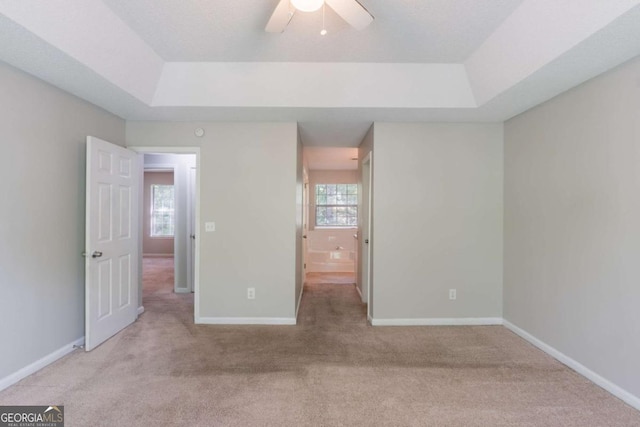 3075 Oakvale Hts, Decatur, GA 30034 - unfurnished bedroom with a tray ceiling and carpet floors