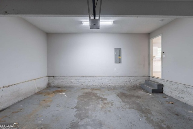 3075 Oakvale Hts, Decatur, GA 30034 - garage with electric panel and a garage door opener