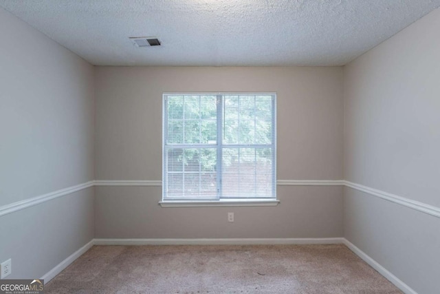 3075 Oakvale Hts, Decatur, GA 30034 - carpeted empty room with a textured ceiling and baseboards