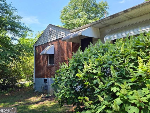 25 Candler Rd SE, Atlanta, GA 30317 - view of side of property featuring brick siding and fence