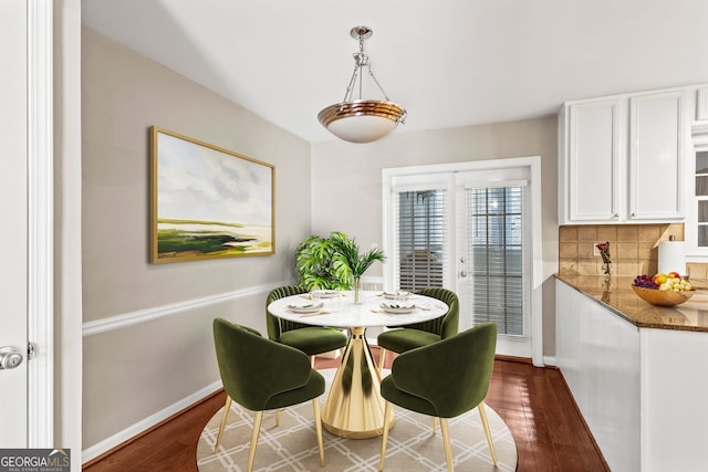 1101 Collier Rd NW Unit K2, Atlanta, GA 30318 - unfurnished dining area with wood finished floors, baseboards, and french doors